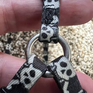 Small skull design dog harness. Black and white